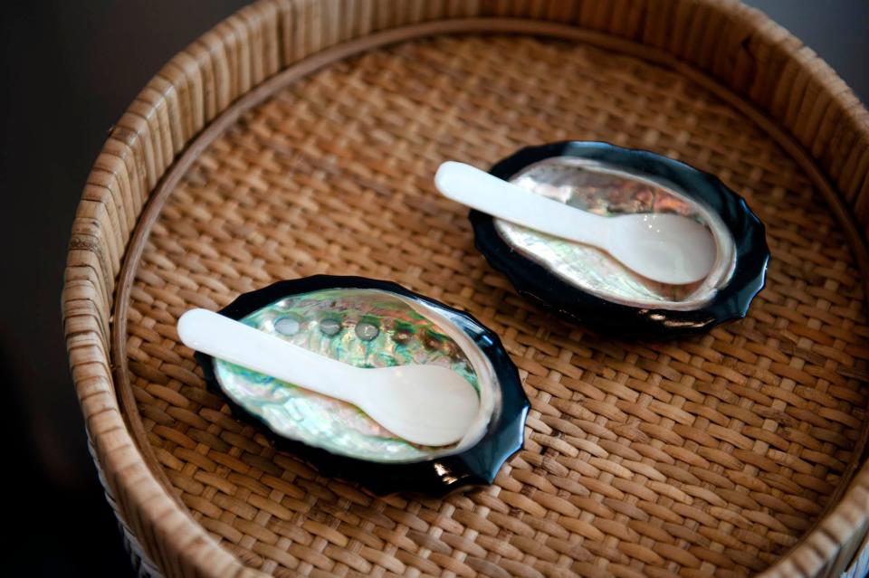 Abalone and acrylic caviar shell and spoon sets are on sale at KELLER.