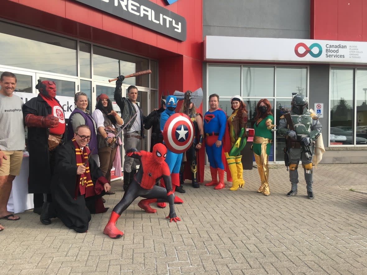 Jack Malott-Clarke, 13, of London, Ont., dressed as Captain America, started the Suit up for Jack cosplay-themed campaign advocating for blood donations. Cosplayers can donate while dressed in costumes.  (Isha Bhargava/CBC - image credit)