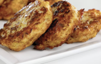 <p>You may know them as fried potato pancakes, but in Hebrew they’re known as levivot and in Yiddish, latkes. Regardless of their name, the delicious crispy fritters are essential to any Hanukkah celebration. </p> <p><a href="https://www.thedailymeal.com/best-recipes/chicken-and-leek-levivot?referrer=yahoo&category=beauty_food&include_utm=1&utm_medium=referral&utm_source=yahoo&utm_campaign=feed" rel="nofollow noopener" target="_blank" data-ylk="slk:For the Chicken and Leek Levivot recipe, click here.;elm:context_link;itc:0;sec:content-canvas" class="link ">For the Chicken and Leek Levivot recipe, click here. </a></p>