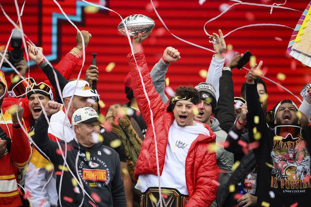 Reed Hoffmann/AP/Shutterstock Patrick Mahomes and Kansas City Chiefs teammates celebrate during the Chiefs' victory celebration and parade in Kansas City in 2023.