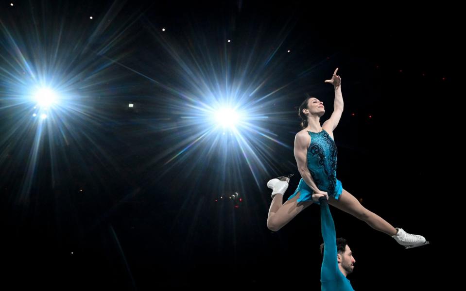 Canada's Deanna Stellato-Dudek and Maxime Deschamps perform in the gala exhibition during the ISU Grand Prix of Figure Skating Final in Beijing