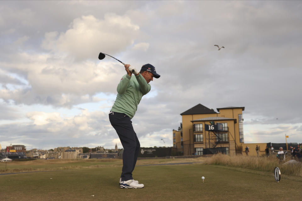 Ireland's Padraig Harrington plays off the 16th tee during the first round of the British Open golf championship on the Old Course at St. Andrews, Scotland, Thursday, July 14, 2022. The Open Championship returns to the home of golf on July 14-17, 2022, to celebrate the 150th edition of the sport's oldest championship, which dates to 1860 and was first played at St. Andrews in 1873. (AP Photo/Peter Morrison)