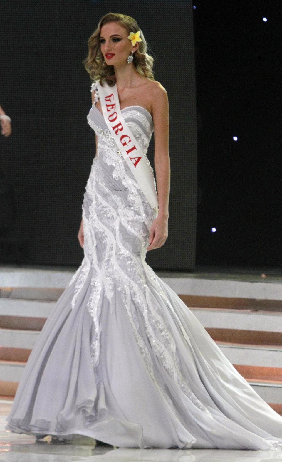 Miss Georgia Tamar Shedaniai walks on stage during opening of the 63rd Miss World Pageant ceremony in Nusa Dua, Bali, Indonesia on Sunday, Sept. 8, 2013. (AP Photo/Firdia Lisnawati)