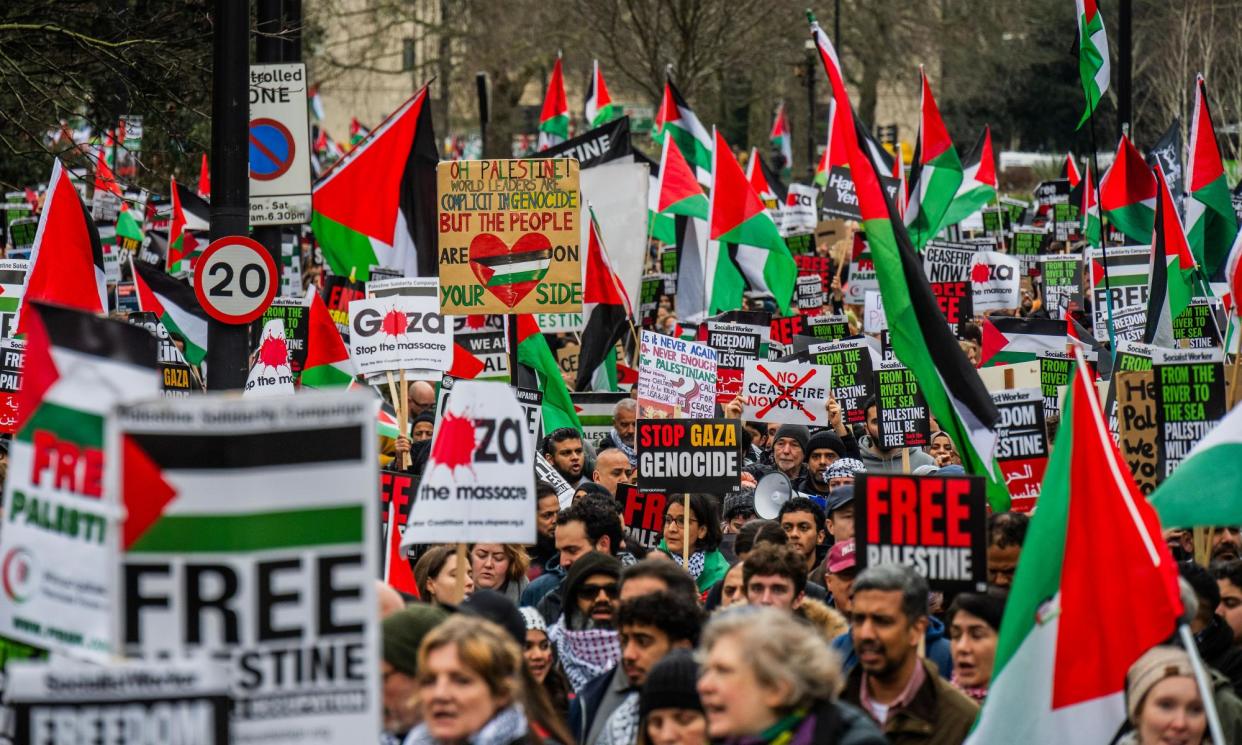 <span>Protesters marching in London against the war in Gaza on 17 February. </span><span>Photograph: Guy Bell/REX/Shutterstock</span>