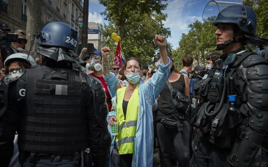 Gilets Jaunes protesters chant at a rally near Place de la Bastille in Paris. CREDIT: GETTY - Kiran Ridley /Getty