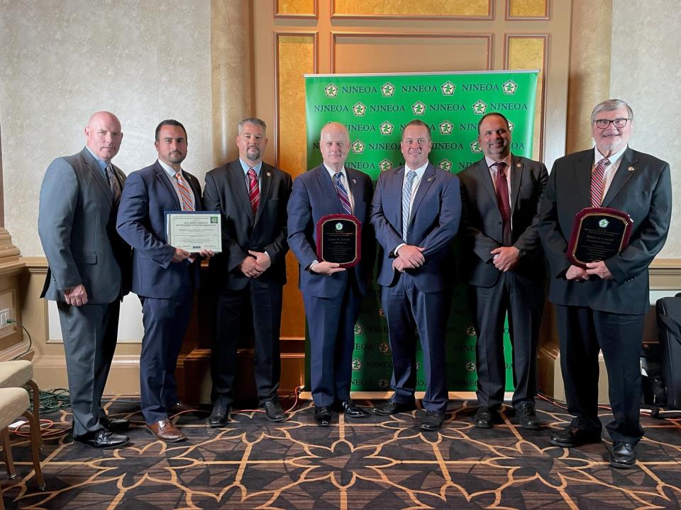 Morris County law enforcement personnel, including Sheriff Jim Gannon, center, and Prosecutor Robert Carroll, far right, show off their awards at the New Jersey Narcotics Enforcement Officers Association awards luncheon in Atlantic City Thursday, June 15, 2023.