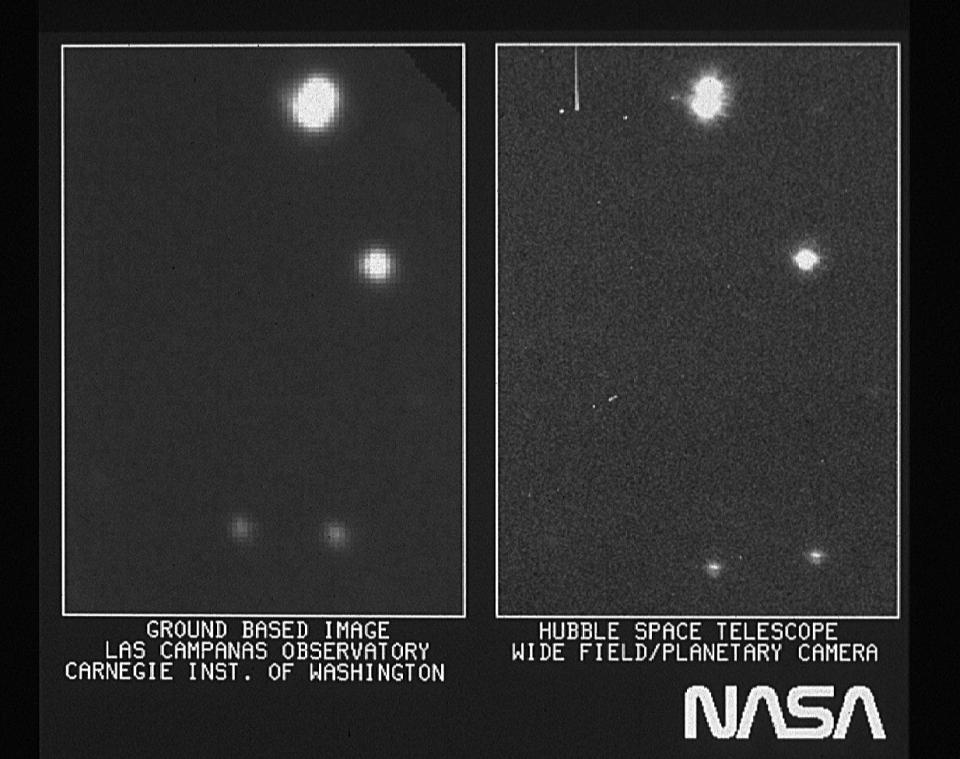 hubble first light image two bright stars black and white