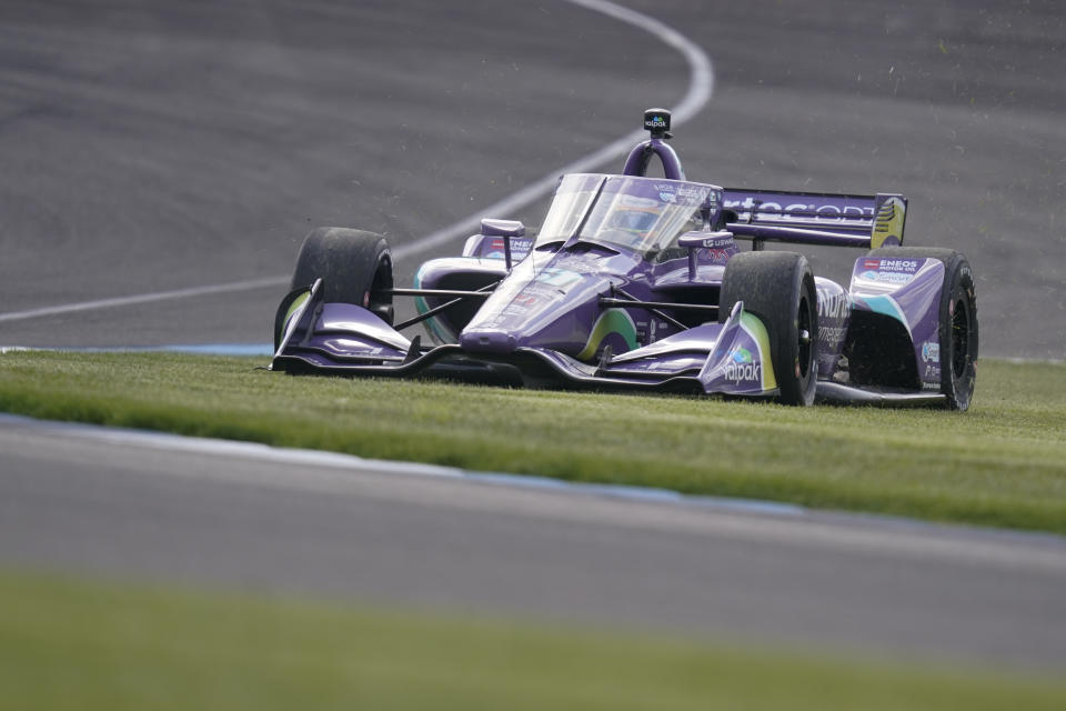 Romain Grosjean, of Switzerland, drives off course during qualifications for the IndyCar auto race at Indianapolis Motor Speedway, Friday, May 14, 2021, in Indianapolis. (AP Photo/Darron Cummings)