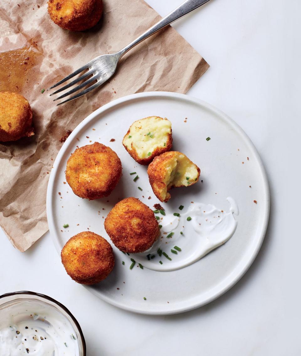 Heads up: Steaming hot, crunchy potato croquettes—also known as the absolute sexiest way to make use of cold, leftover mashed potatoes—have entered the chat. <a href="https://www.bonappetit.com/recipe/mashed-potato-croquettes?mbid=synd_yahoo_rss" rel="nofollow noopener" target="_blank" data-ylk="slk:See recipe.;elm:context_link;itc:0" class="link ">See recipe.</a>