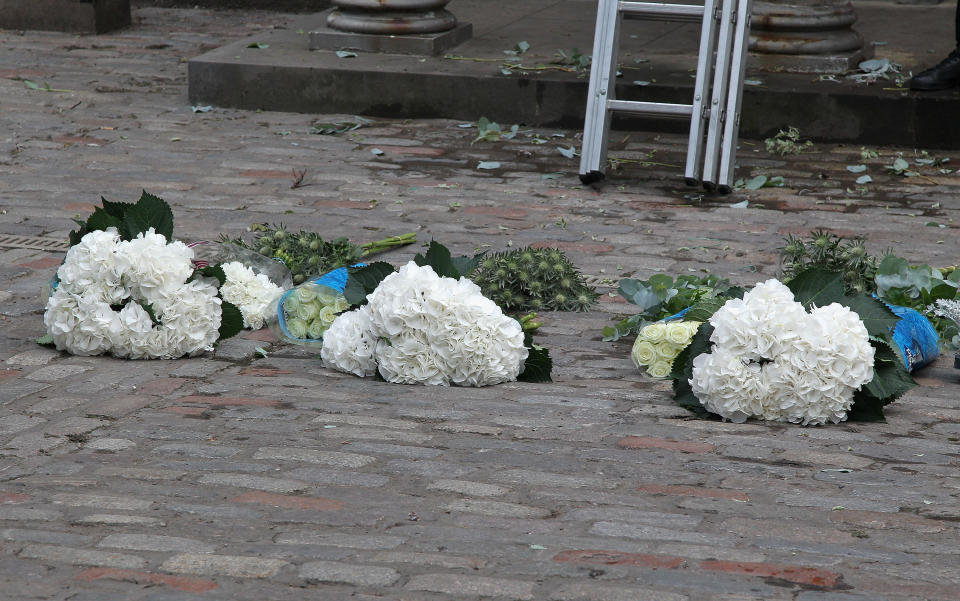 EDINBURGH, SCOTLAND - JULY 30:  Flowers are bundled on the street as workers arrange them outside Canongate Kirk on the morning of the wedding of Mike Tindall and Zara Phillips on July 30, 2011 in Edinburgh, Scotland. The Queen's granddaughter Zara Phillips will marry England rugby player Mike Tindall today at Canongate Kirk. Many royals are expected to attend including the Duke and Duchess of Cambridge.  (Photo by Chris Jackson/Getty Images)