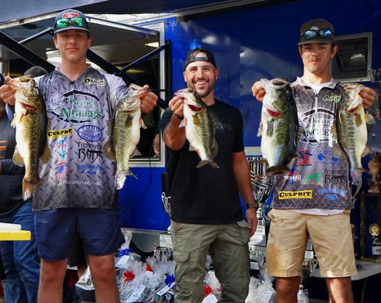 Jordan Brandon, 'Jiggin' With Jordan,' center, poses with High School Division anglers Tripp Berlinsky and Jacob Sharpe of Osceola Anglers. The two placed first in the High School Division with 22.05 pounds during the 2022 Bobby Lane High School Cup Tournament on Dec. 3, on the Kissimmee Chain.