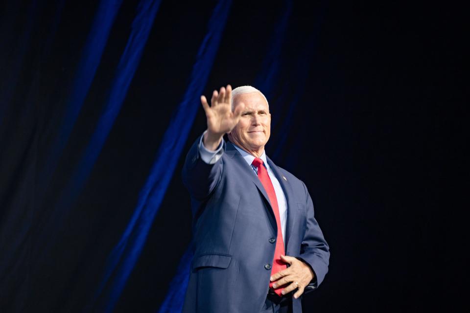 Former Vice President Mike Pence talks with moderator Tucker Carlson, left, during the Family Leadership Summit in Des Moines, Friday, July 14, 2023. 