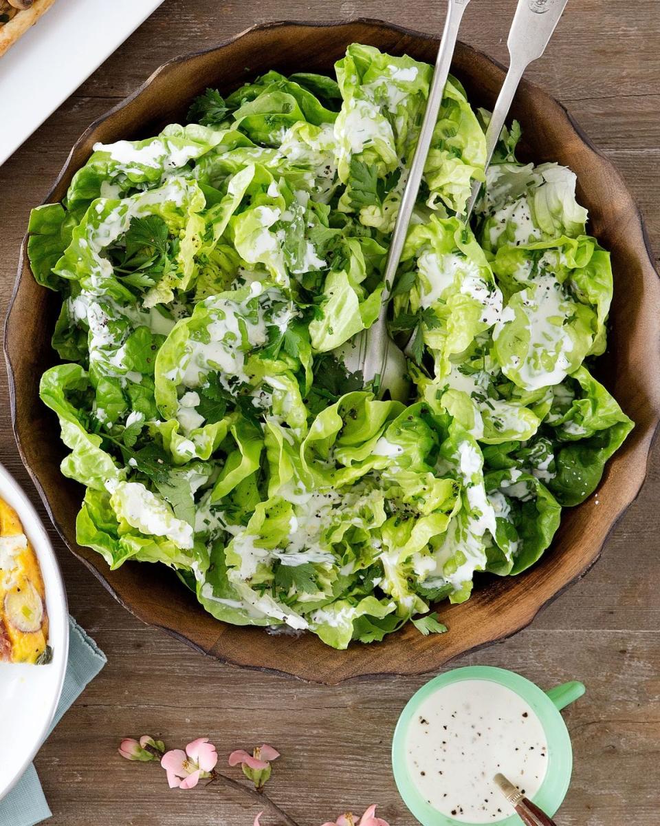 <p>This simple salad can be made in under 10 minutes!</p><p><strong><a href="https://www.countryliving.com/food-drinks/recipes/a35033/creamy-bibb-and-herb-salad/" rel="nofollow noopener" target="_blank" data-ylk="slk:Get the recipe for Creamy Bibb-and-Herb Salad;elm:context_link;itc:0;sec:content-canvas" class="link ">Get the recipe for Creamy Bibb-and-Herb Salad</a>.</strong></p>