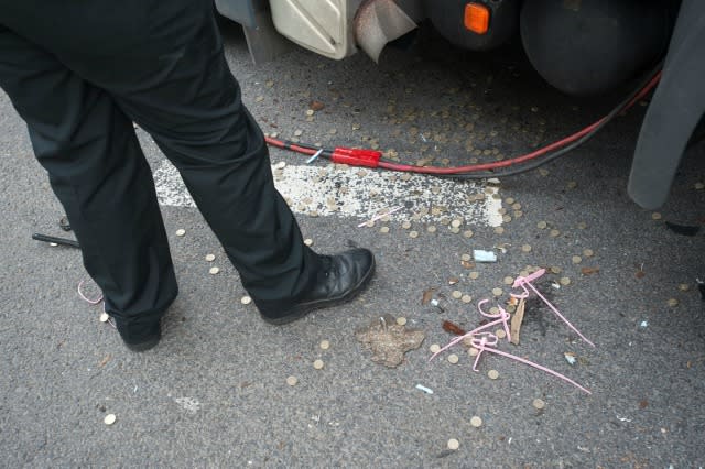 Coins spilled from lorry