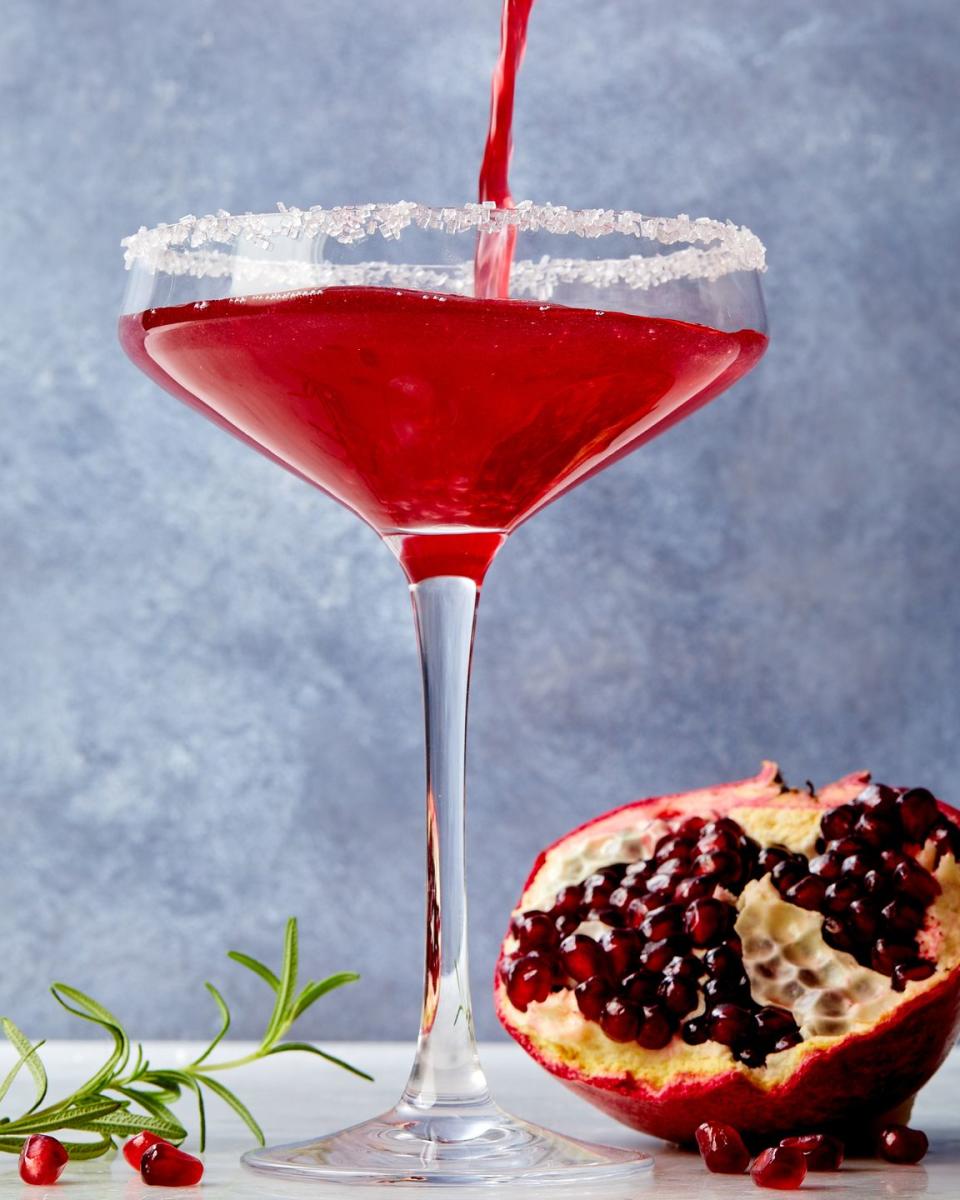 <p>More like a <a href="https://www.delish.com/cooking/recipe-ideas/a31289978/perfect-cosmopolitan-cocktail-recipe/" rel="nofollow noopener" target="_blank" data-ylk="slk:Cosmopolitan" class="link ">Cosmopolitan</a> than a classic <a href="https://www.delish.com/cooking/recipe-ideas/a29252178/classic-vodka-martini-recipe/" rel="nofollow noopener" target="_blank" data-ylk="slk:martini" class="link ">martini</a>, this recipe replaces the Cosmo’s traditional cranberry juice with pomegranate. Garnish with a sugar rim and a fresh rosemary sprig for the perfect drink to serve your sweetie.</p><p>Get the <strong><a href="https://www.delish.com/cooking/recipe-ideas/a42164131/pomegranate-martini-recipe/" rel="nofollow noopener" target="_blank" data-ylk="slk:Pomegranate Martini recipe" class="link ">Pomegranate Martini recipe</a></strong>.</p>