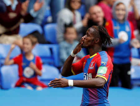 FILE PHOTO: Soccer Football - Pre Season Friendly - Reading v Crystal Palace - Madejski Stadium, Reading, Britain - July 28, 2018 Crystal Palace's Wilfried Zaha celebrates scoring their third goal Action Images via Reuters/John Sibley