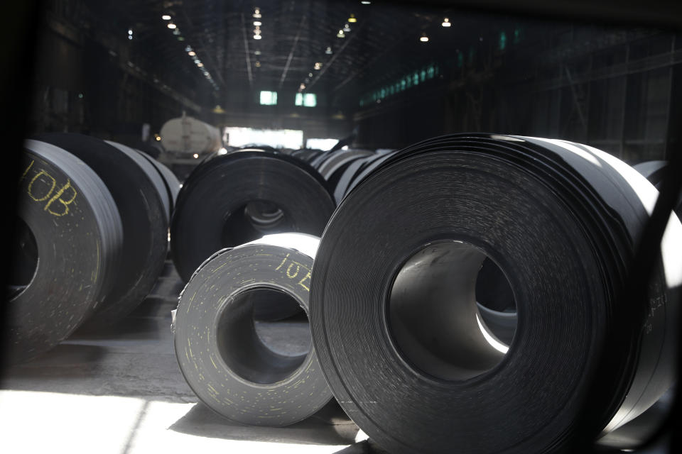FILE - In this June 28, 2018, file photo, rolls of finished steel are seen at the U.S. Steel Granite City Works facility in Granite City, Ill. President Donald Trump’s decision last year to tax imported steel tested the limits of his legal authority, strained relations with key U.S. allies and imposed higher costs and uncertainty on much of American industry. But his 25% tariffs haven’t even done much for the companies they were supposed to help. (AP Photo/Jeff Roberson, File)