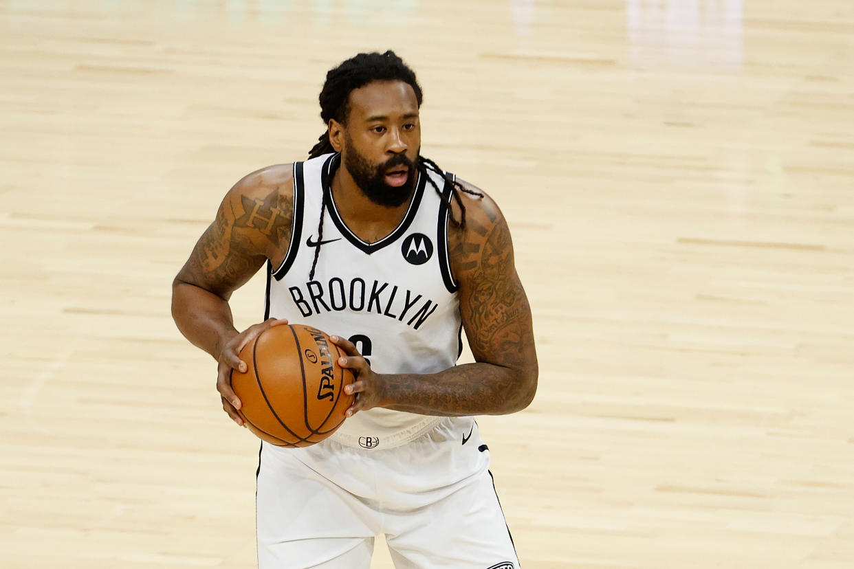 PHOENIX, ARIZONA - FEBRUARY 16: DeAndre Jordan #6 of the Brooklyn Nets handles the ball against the Phoenix Suns during the NBA game at Phoenix Suns Arena on February 16, 2021 in Phoenix, Arizona. The Nets defeated the Suns 128-124. NOTE TO USER: User expressly acknowledges and agrees that, by downloading and or using this photograph, User is consenting to the terms and conditions of the Getty Images License Agreement. (Photo by Christian Petersen/Getty Images)