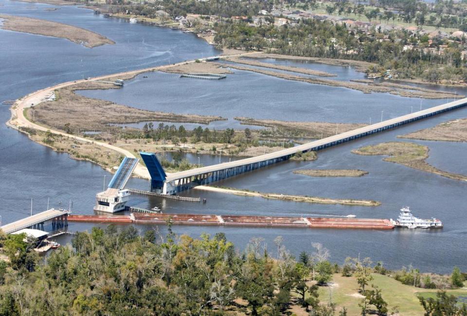 An Aerial photograph of damage to the Popp’s Ferry Bridge after being hit by a barge early Friday morning. The barge took out a large section of the span on the south side of the drawbridge.