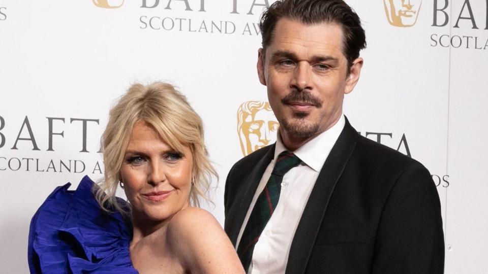 Ashley Jensen poses on the red carpet with her new husband Kenny Doughty