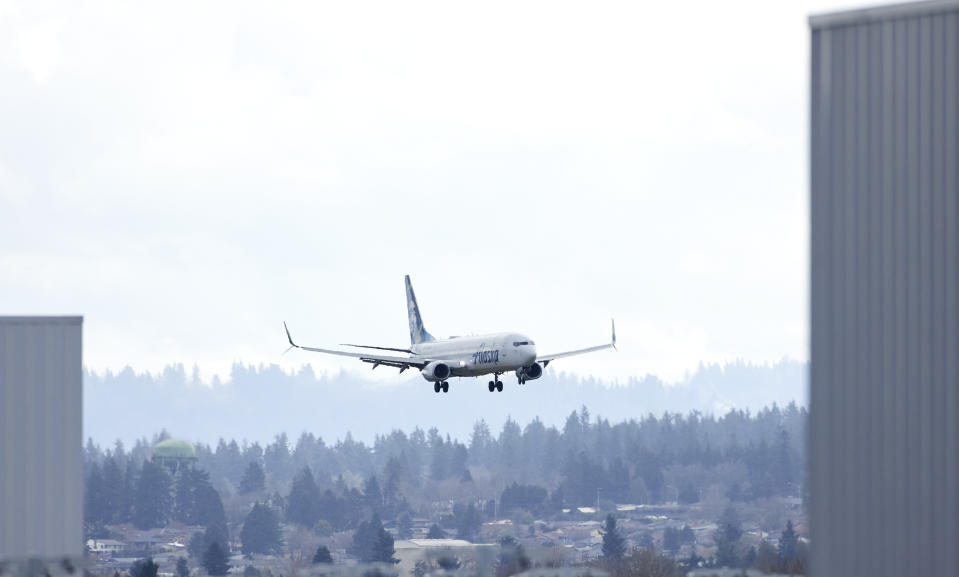 An Alaska Airlines Boeing 737-990ER flight 337 from Fort Lauderdale, Fla., lands at Portland International Airport in Portland, Ore., Saturday, Jan. 6, 2024. The FAA has ordered the temporary grounding of Boeing 737 MAX 9 aircraft after part of the fuselage blew out during a flight. (AP Photo/Craig Mitchelldyer)
