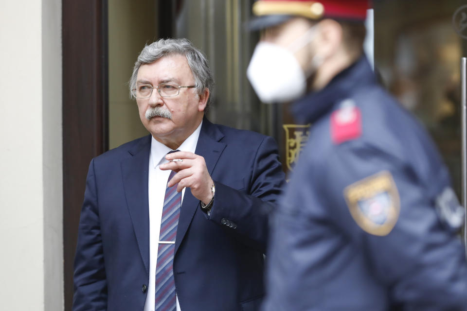 Russia's Governor to the International Atomic Energy Agency (IAEA), Mikhail Ulyanov, has a cigarette break outside of the 'Grand Hotel Wien' where closed-door nuclear talks with Iran take place in Vienna, Austria, Friday, May 7, 2021. (AP Photo/Lisa Leutner)