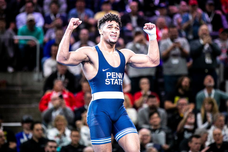 Penn State sophomore Carter Starocci celebrates after winning his second straight national title at 174 pounds at the NCAA Division I Championships on March 19 at Little Caesars Arena in Detroit.