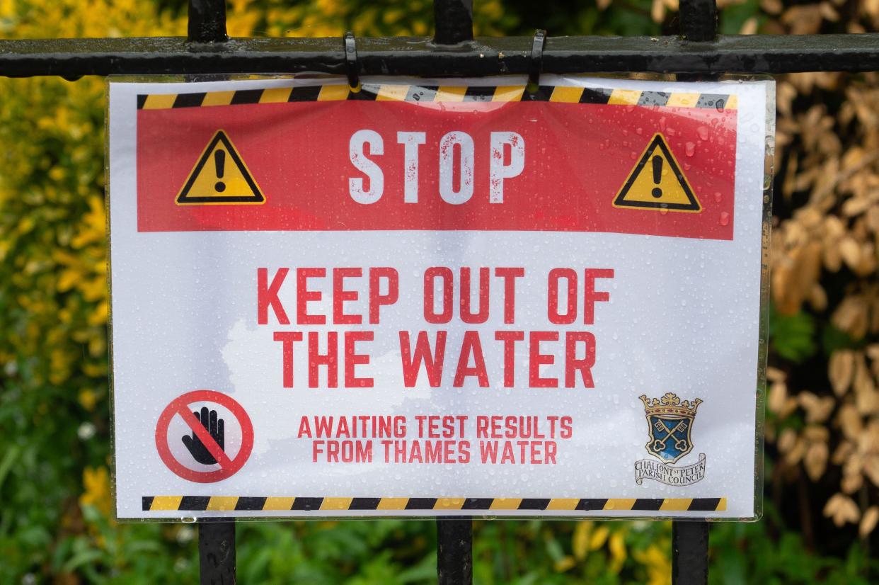 Chalfont St Peter, UK. 9th July, 2024. Signs have been put up next to the River Misbourne in Chalfont St Peter, Buckinghamshire advising people to keep out of the water. Since January this year Thames Water have been discharging sewage from the Amersham Balacing Tanks into the River Misbourne for more than 3,500 hours. The Misbourne is a precious chalk stream, which runs through Chalfont St Giles and Chalfont St Peter. Sewage overflow was also pumped into the River Misbourne by Thames Water in Chalfont St Peter in the first half of the year following flooding and a rise in groundwater and ther