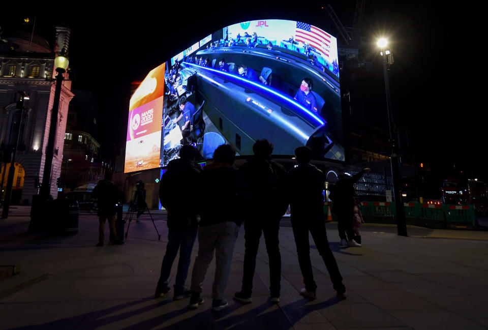 <p>LONDON, ENGLAND - FEBRUARY 18: A general view of the live-stream landing of NASA's Perseverance on Mars at Piccadilly Circus on February 18, 2021 in London, England. The rover has been traveling through space since launching from Cape Canaveral at the end of July 2020. (Photo by Stuart C. Wilson/Getty Images)</p>
