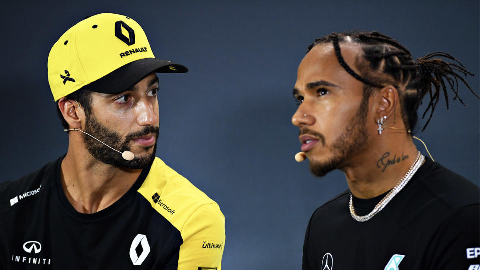 Renault's Daniel Ricciardo (pictured left) talking to Mercedes' Lewis Hamilton (pictured right).