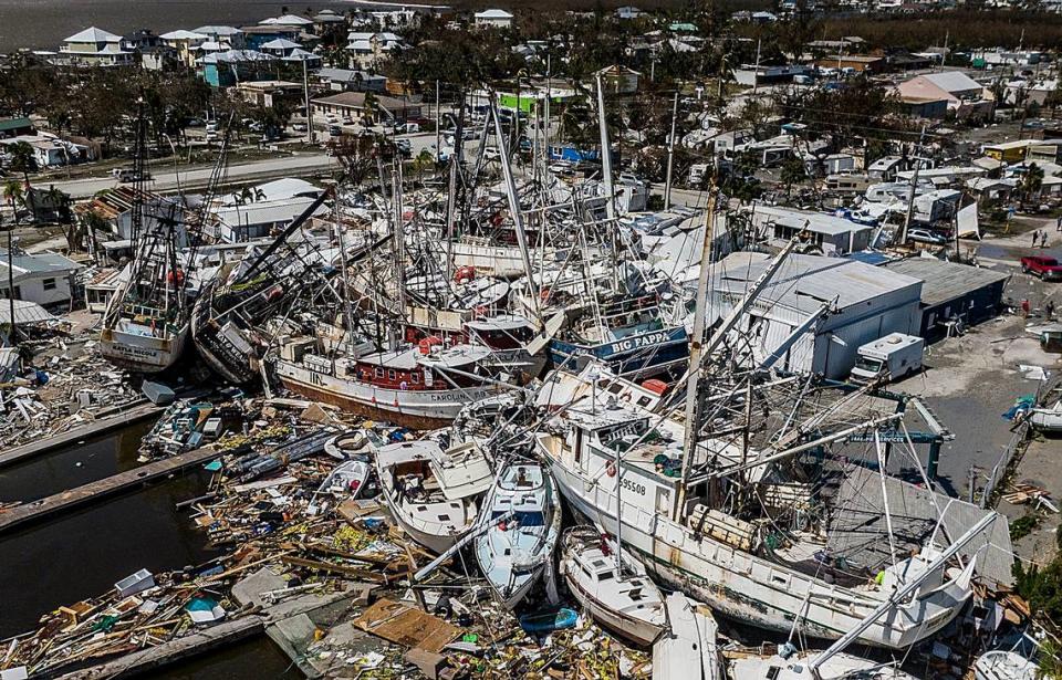 A day after Hurricane Ian hit Florida’s west coast as a Category 4 storm, wrecked ships (mostly shrimpers) can be seen at San Carlos Island in Fort Myers Beach on Sept. 29, 2022.