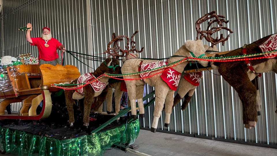 A Santa Claus practices riding a sleigh for a parade during the Charles W Howard Santa School. (Ezra Kaplan / NBC News)