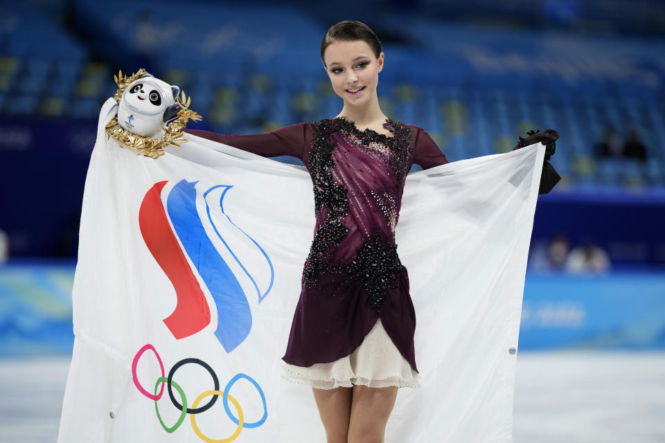 Gold medalist, Anna Shcherbakova, of the Russian Olympic Committee, poses during a venue ceremony after the women's free skate program during the figure skating competition at the 2022 Winter Olympics, Thursday, Feb. 17, 2022, in Beijing. (AP Photo/Bernat Armangue)