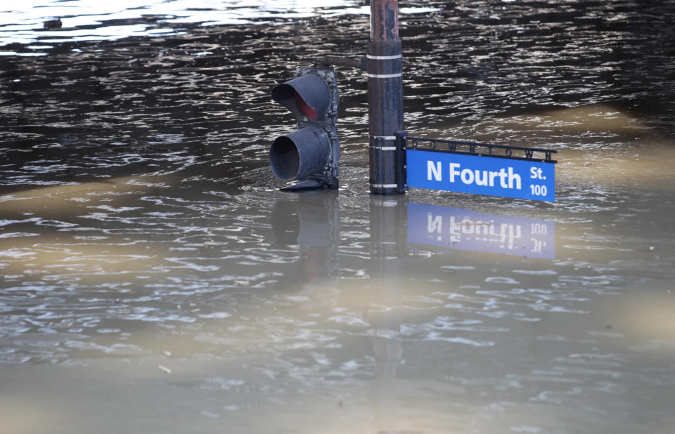 <p>Water covers downtown streets after the Ohio River flooded in Louisville, Ky., Feb. 26, 2018. (Photo: John Sommers II/Reuters) </p>