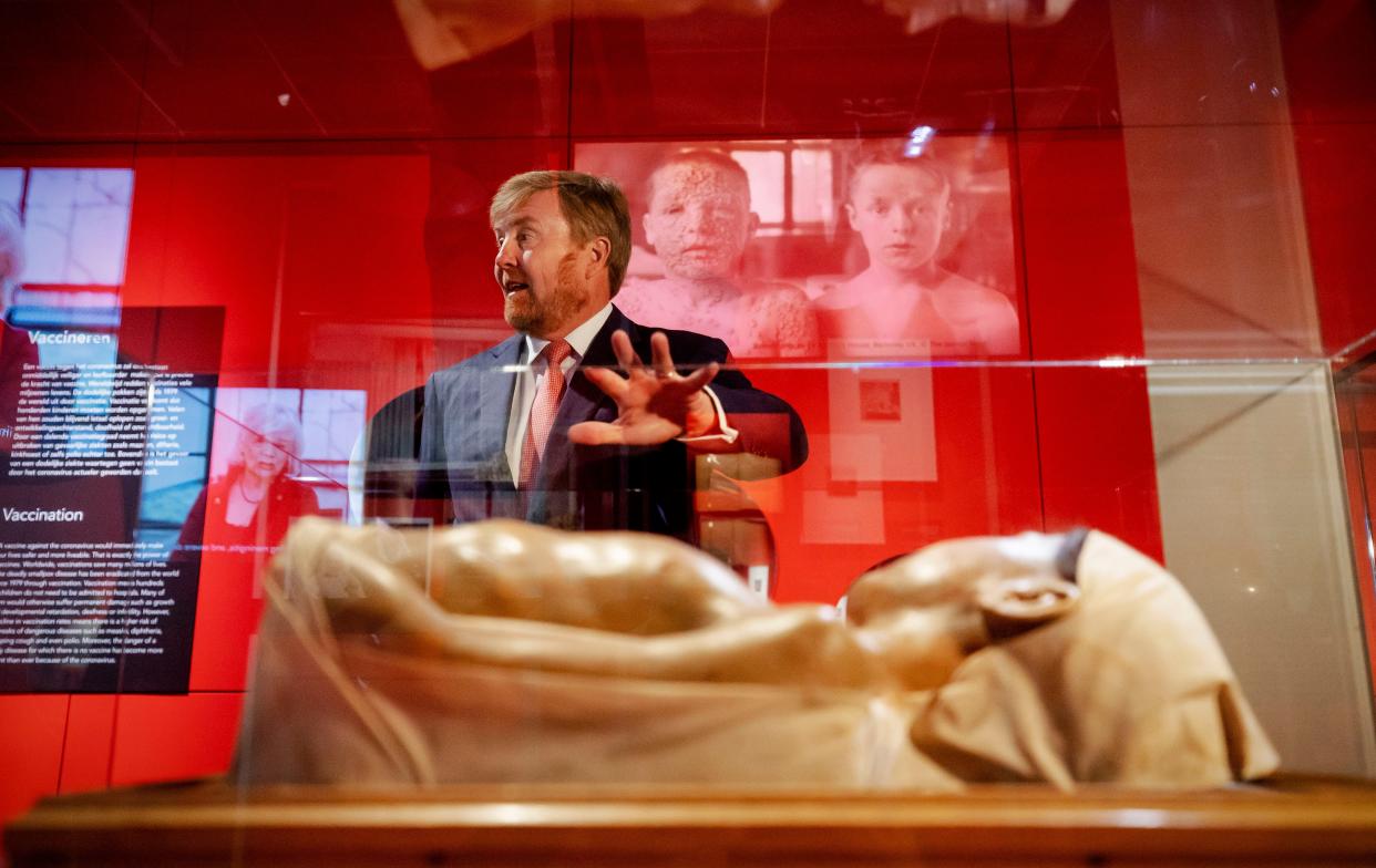 Dutch King Willem-Alexander tours the "Contagious!" exhibit at Rijksmuseum Boerhaave in Leiden, Netherlands on Thursday, July 16, 2020. The museum finally opened an exhibition Thursday on contagious diseases through the ages after a long delay caused by the disease currently sweeping the world, COVID-19.