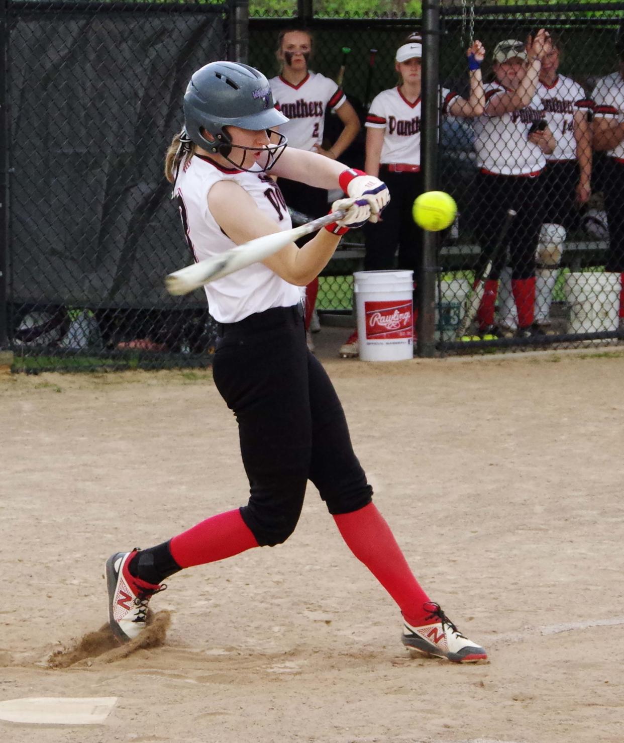 Turyn Leonard takes a big cut at a pitch in the softball game aginst Quincy. Leonard had a big game for the Panthers, scoring numerous runs and hitting a grand slam on Thursday, May 11, 2023.