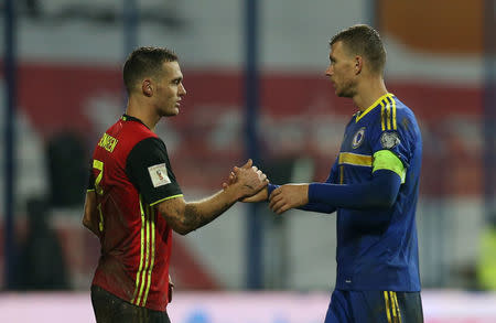 Bosnia’s Edin Dzeko shakes hands with Belgium's Thomas Vermaelen after the match REUTERS/Dado Ruvic