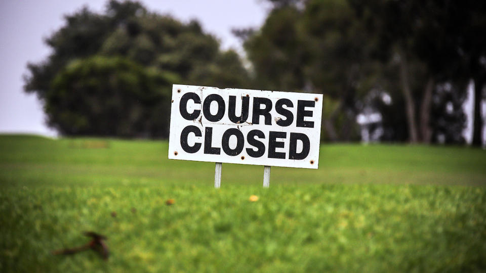 A sign, pictured here displaying the closure of the local Mollymook Golf Course.