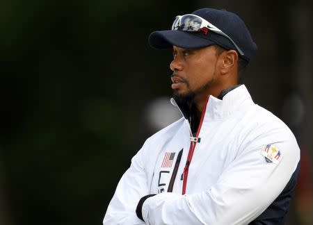 Team USA vice-captain Tiger Woods talk at the 13th green during the practice round for the Ryder Cup at Hazeltine National Golf Club in Chaska, Minnesota, September 28, 2016. Mandatory Credit: Michael Madrid-USA TODAY Sports/File photo