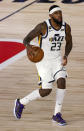 Utah Jazz's Royce O'Neale brings the ball up during the third quarter against the Denver Nuggets in Game 5 of an NBA basketball first-round playoff series, Tuesday, Aug. 25, 2020, in Lake Buena Vista, Fla. (Mike Ehrmann/Pool Photo via AP)