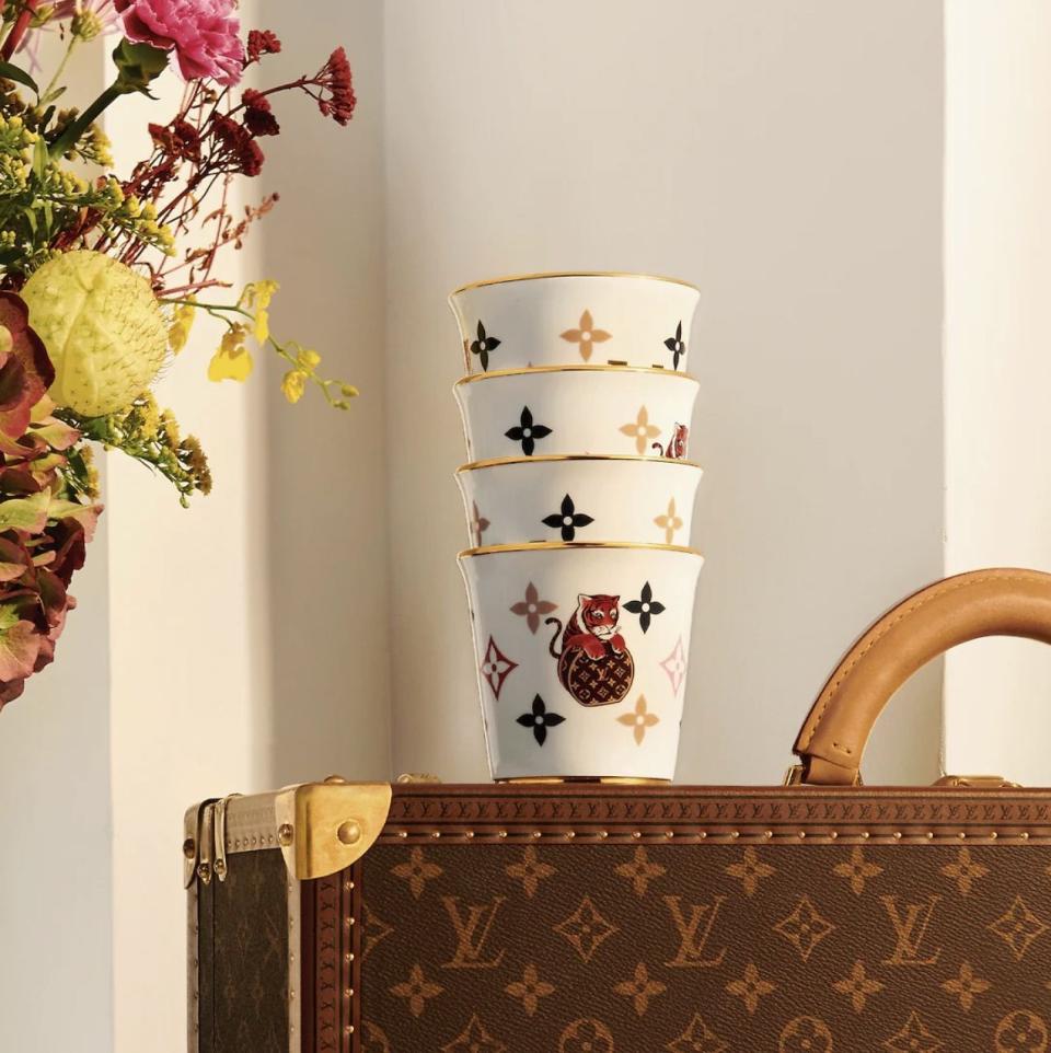 <p><strong>Louis Vuitton</strong></p><p>louisvuitton.com</p><p><strong>$1090.00</strong></p><p><a href="https://us.louisvuitton.com/eng-us/products/set-of-4-cup-monogram-nvprod3390031v" rel="nofollow noopener" target="_blank" data-ylk="slk:Shop Now;elm:context_link;itc:0;sec:content-canvas" class="link ">Shop Now</a></p><p>“Paw” yourself a drink in these eye-catching, limited-edition cups from Louis Vuitton. Each ceramic vessel is covered in the <a href="https://www.elledecor.com/life-culture/a37869137/louis-vuitton-200th-birthday/" rel="nofollow noopener" target="_blank" data-ylk="slk:famed fashion house’s;elm:context_link;itc:0;sec:content-canvas" class="link ">famed fashion house’s</a> signature print and features a tiger clasping its own satchel. They’re bound to be your favorite new accessory. </p>