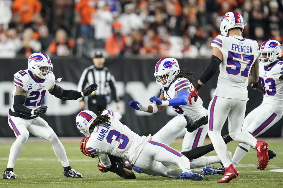 Cincinnati Bengals wide receiver Tee Higgins (85) collides with Buffalo Bills safety Damar Hamlin (3) during the first half of an NFL football game, Monday, Jan. 2, 2023, in Cincinnati. Hamlin was injured on the play. Tonight's Buffalo Bills-Cincinnati Bengals game has been postponed after Buffalo Bills' Damar Hamlin collapsed, NFL Commissioner Roger Goodell announced. (AP Photo/Joshua A. Bickel)