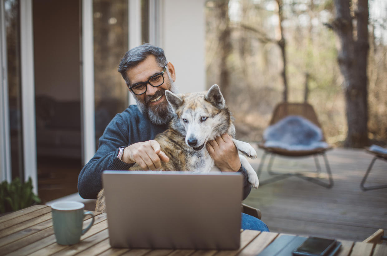 Connecting digitally and thinking about a pet could also help ease loneliness. (Posed by model, Getty Images)