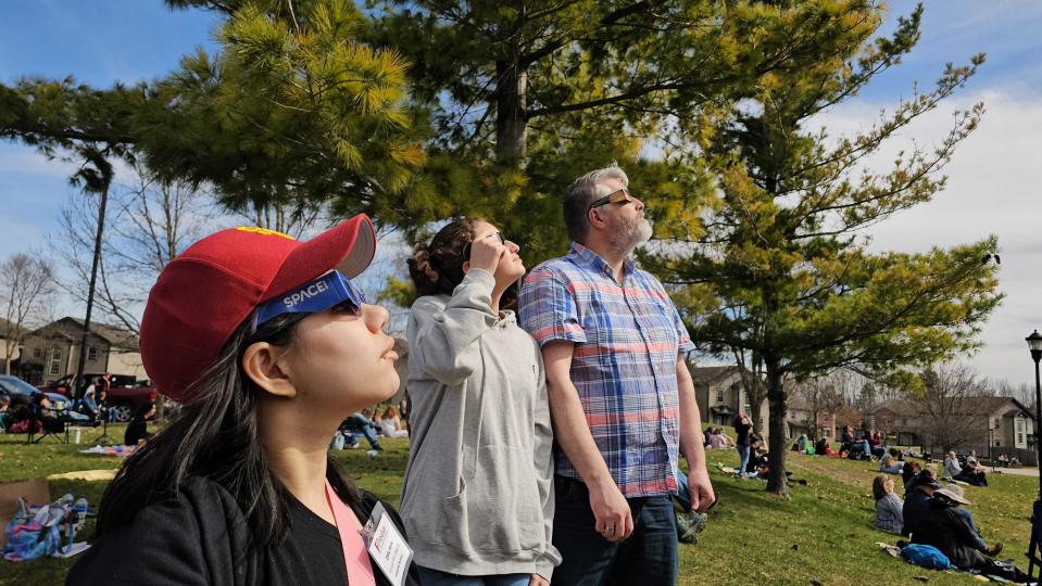 People watching the total solar eclipse in Potsdam, New York, on April 8