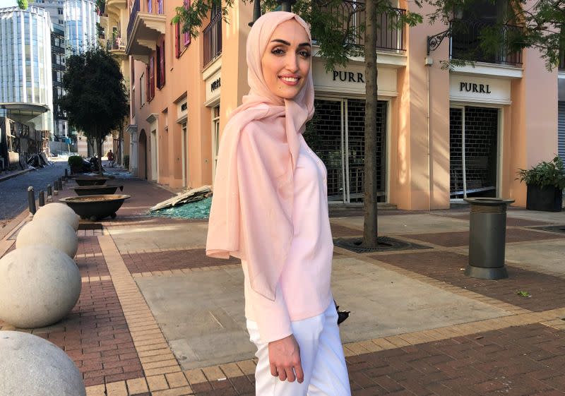 Bride Israa Seblani poses for a picture in the same place where she was taking her wedding photos yesterday at the moment of the explosion that occurred at Beirut's port area