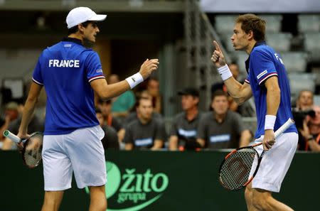 Tennis - Croatia v France - Davis Cup Semi Final - Kresimir Cosic Hall, Zadar, Croatia - 17/9/16 France's Pierre-Hugues Herbert and Nicolas Mahut in action during their men's doubles match against Croatia's Marin Cilic and Ivan Dodig. REUTERS/Antonio Bronic