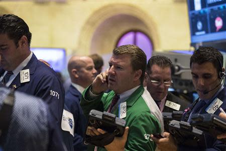 Traders work on the floor of the New York Stock Exchange, October 1, 2013. REUTERS/Brendan McDermid