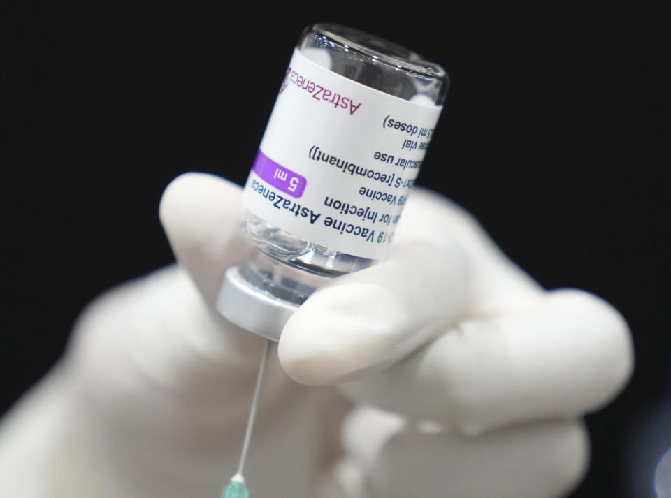 A health worker prepares a dose of the AstraZeneca COVID-19 vaccine at the shopping mall in Bangkok, Thailand, Monday, June 7, 2021. Health authorities in Thailand on Monday began their much-anticipated mass rollout of locally produced AstraZeneca vaccine, but it appeared that supplies were falling short of demand from patients who had scheduled vaccinations for this week. (AP Photo/Sakchai Lalit)