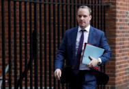 Britain's Foreign Secretary Dominic Raab is seen outside Downing Street in London