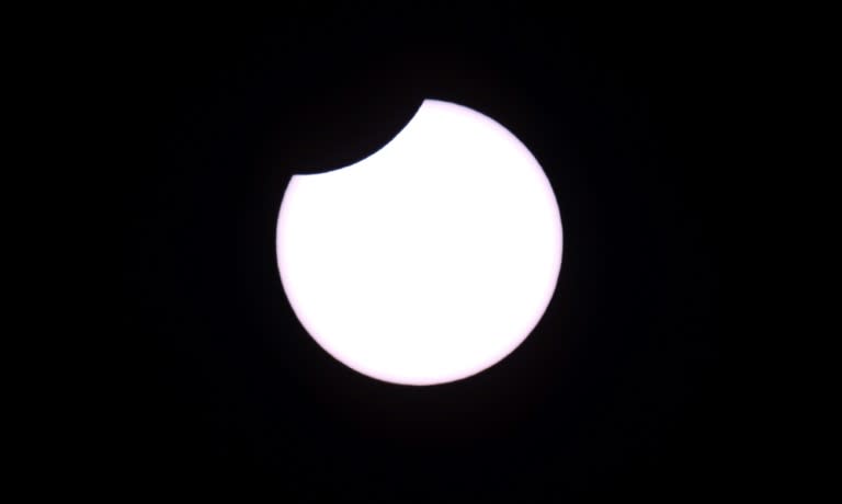 The moon moves to cover the sun for an annular solar eclipse, as seen from the Estancia El Muster, south of Buenos Aires, Argentina, on February 26, 2017